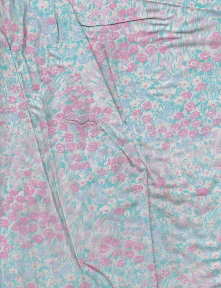 A scan of Alexis's abuela's nightgown. It's pink and blue and floral